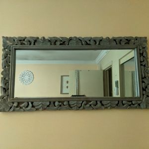 Gray carved mirror